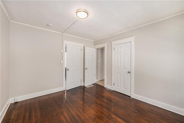 3842 E 68th Ter, Kansas City, MO 64132 - unfurnished room with wood finished floors, ornamental molding, a textured ceiling, and a smoke detector