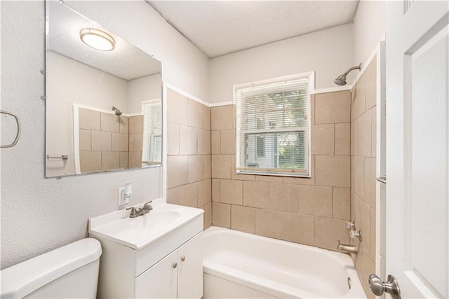 3842 E 68th Ter, Kansas City, MO 64132 - full bathroom with vanity, shower / bathtub combination, and a textured ceiling