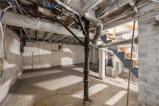 3842 E 68th Ter, Kansas City, MO 64132 - unfinished basement with stairway