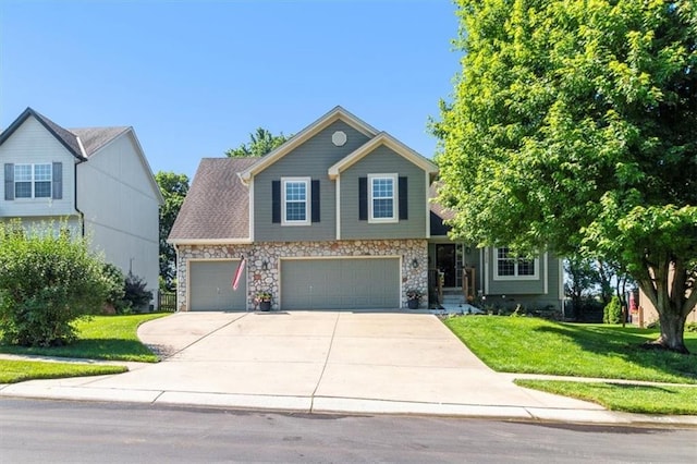 2125 SW Post Oak Rd, Lees Summit, MO 64082 - view of front facade featuring concrete driveway, a front yard, a garage, and stone siding