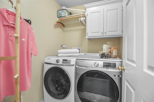2125 SW Post Oak Rd, Lees Summit, MO 64082 - laundry area featuring washing machine and dryer and cabinet space