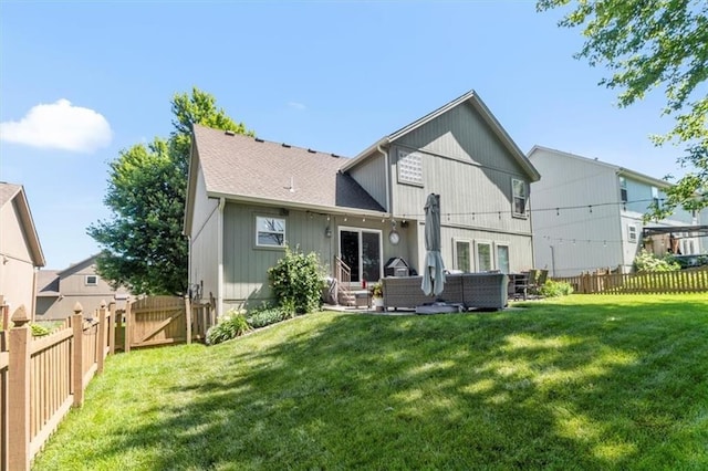 2125 SW Post Oak Rd, Lees Summit, MO 64082 - rear view of property with a fenced backyard, a gate, an outdoor hangout area, and a shingled roof