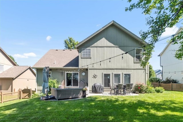2125 SW Post Oak Rd, Lees Summit, MO 64082 - rear view of property with a fenced backyard, a patio area, and a gate