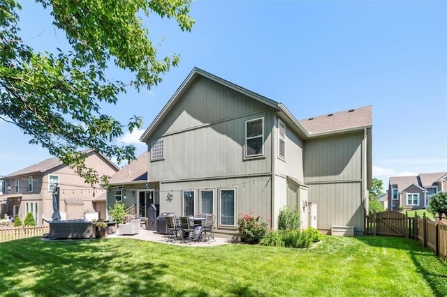 2125 SW Post Oak Rd, Lees Summit, MO 64082 - back of house featuring a fenced backyard, a patio, and a gate