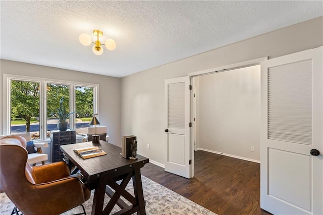 1424 E Meadow Ln, Olathe, KS 66062 - office featuring dark wood finished floors and a textured ceiling