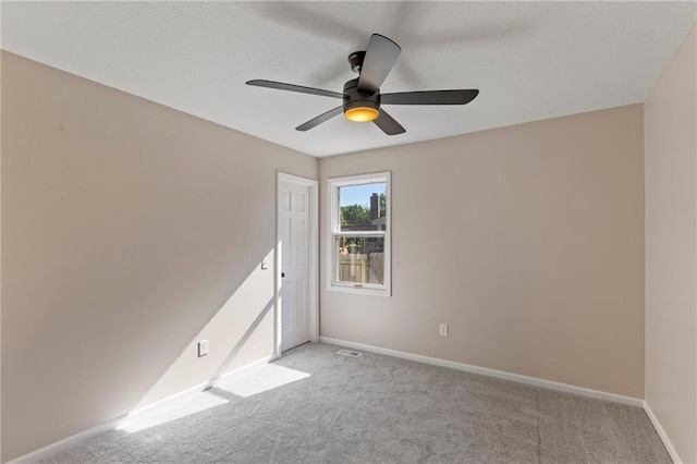 1424 E Meadow Ln, Olathe, KS 66062 - spare room with light carpet and a ceiling fan