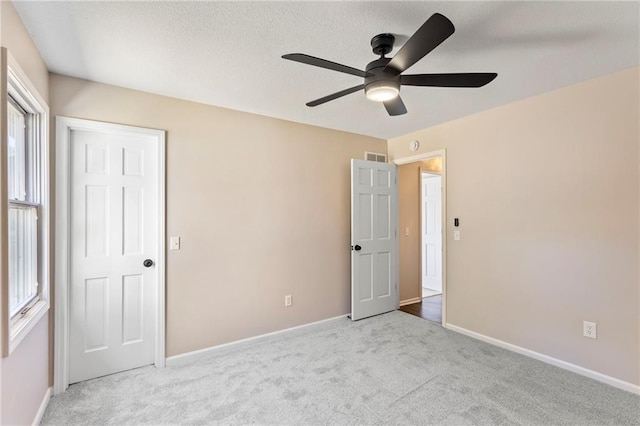 1424 E Meadow Ln, Olathe, KS 66062 - unfurnished bedroom with carpet flooring and ceiling fan