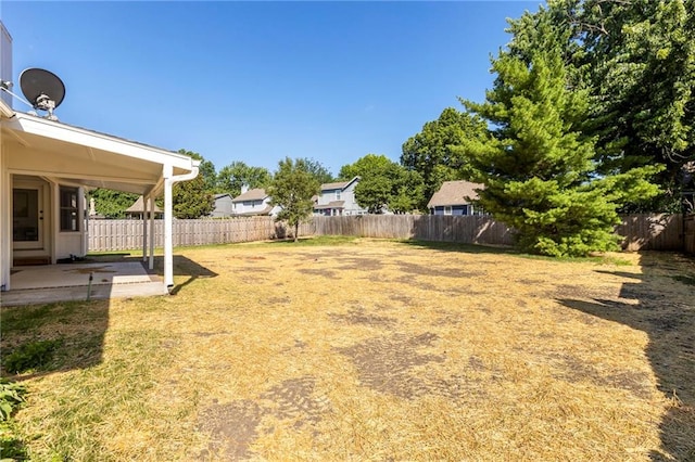 1424 E Meadow Ln, Olathe, KS 66062 - fenced backyard featuring a patio