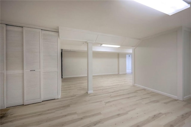 6605 Willow Ave, Raytown, MO 64133 - finished basement with wood finished floors and baseboards