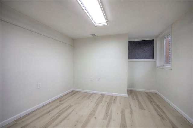 6605 Willow Ave, Raytown, MO 64133 - unfurnished room featuring wood finished floors and baseboards