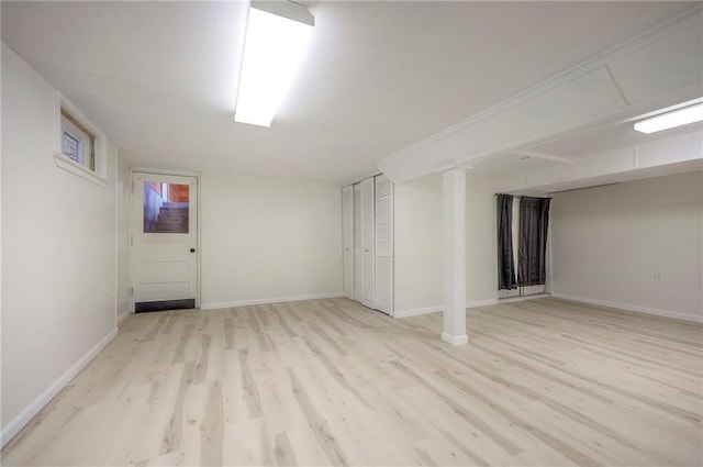 6605 Willow Ave, Raytown, MO 64133 - finished basement featuring wood finished floors and baseboards