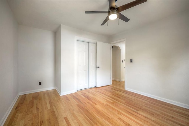 6605 Willow Ave, Raytown, MO 64133 - unfurnished bedroom with light wood-style flooring, a closet, and a ceiling fan