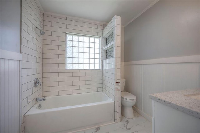 6605 Willow Ave, Raytown, MO 64133 - bathroom featuring vanity, shower / bath combination, marble look tiles, wainscoting, and ornamental molding