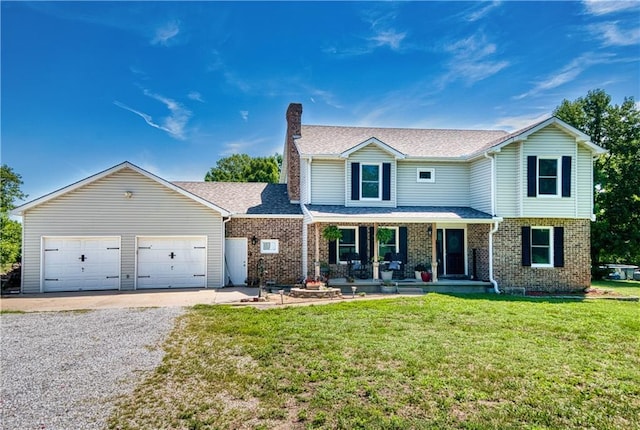 440 41p Rd, Clinton, MO 64735 - traditional-style home with a porch, a chimney, a front lawn, brick siding, and gravel driveway