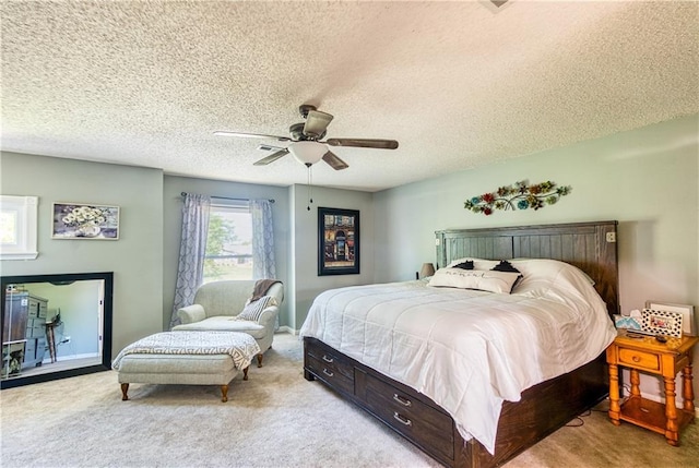 440 41p Rd, Clinton, MO 64735 - bedroom with carpet flooring, a textured ceiling, and ceiling fan
