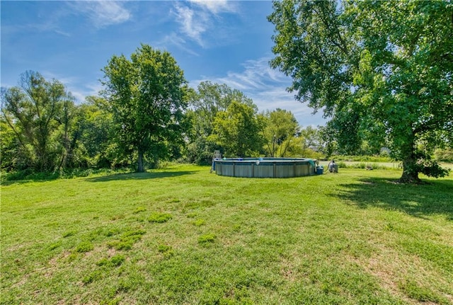 440 41p Rd, Clinton, MO 64735 - view of grassy yard featuring an outdoor pool
