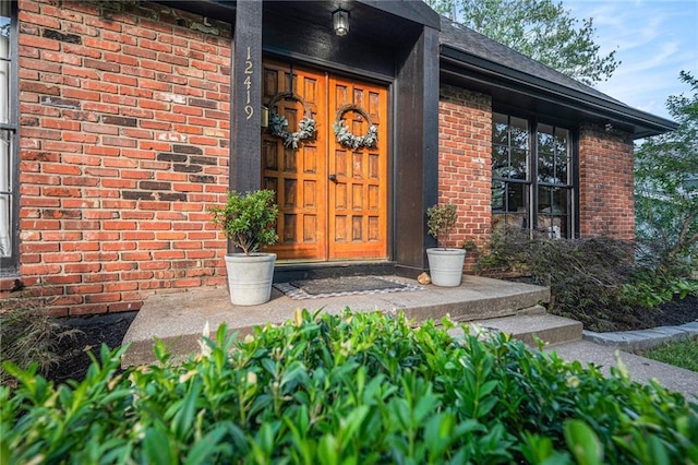 12419 Askew Dr, Grandview, MO 64030 - entrance to property with brick siding