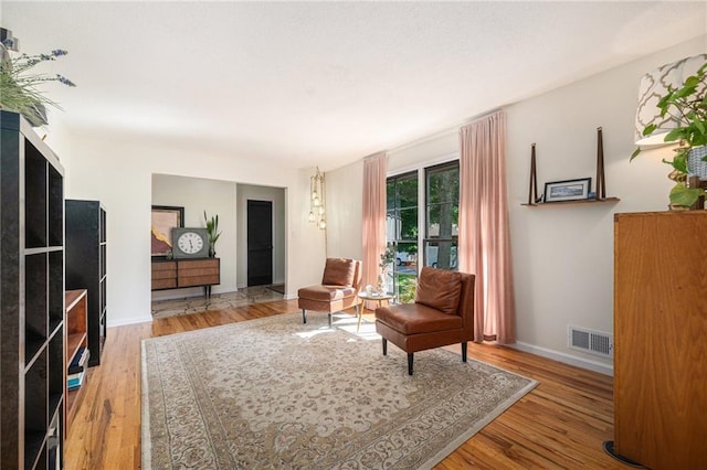 12419 Askew Dr, Grandview, MO 64030 - sitting room featuring wood finished floors