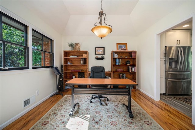 12419 Askew Dr, Grandview, MO 64030 - office space with wood finished floors and vaulted ceiling