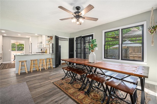 12419 Askew Dr, Grandview, MO 64030 - dining room with dark wood-style floors, a ceiling fan, and recessed lighting