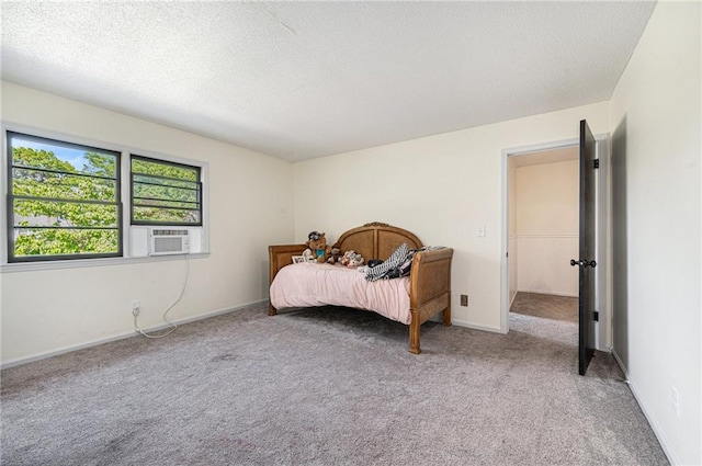12419 Askew Dr, Grandview, MO 64030 - bedroom featuring cooling unit, carpet flooring, and a textured ceiling