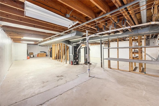 12419 Askew Dr, Grandview, MO 64030 - unfinished basement with heating unit and gas water heater