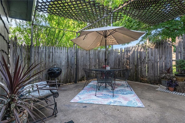 12419 Askew Dr, Grandview, MO 64030 - fenced backyard featuring outdoor dining area, a patio, a pergola, and grilling area