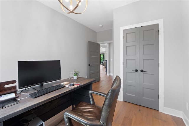 23717 W 118th Ter, Olathe, KS 66061 - home office with light wood-type flooring and a chandelier