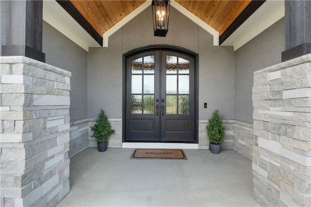 23717 W 118th Ter, Olathe, KS 66061 - entrance to property featuring french doors and stucco siding
