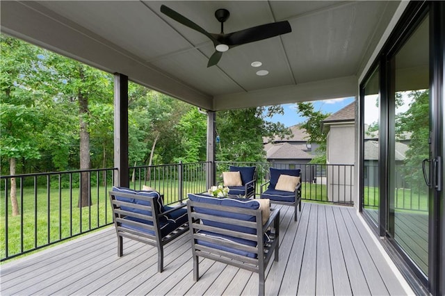 23717 W 118th Ter, Olathe, KS 66061 - deck featuring an outdoor living space, ceiling fan, and a lawn