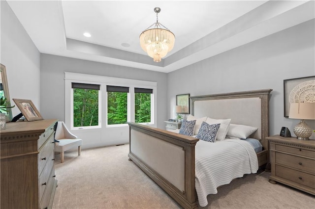 23717 W 118th Ter, Olathe, KS 66061 - bedroom featuring light colored carpet, a chandelier, and a tray ceiling