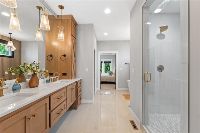 23717 W 118th Ter, Olathe, KS 66061 - bathroom featuring connected bathroom, double vanity, a stall shower, and recessed lighting