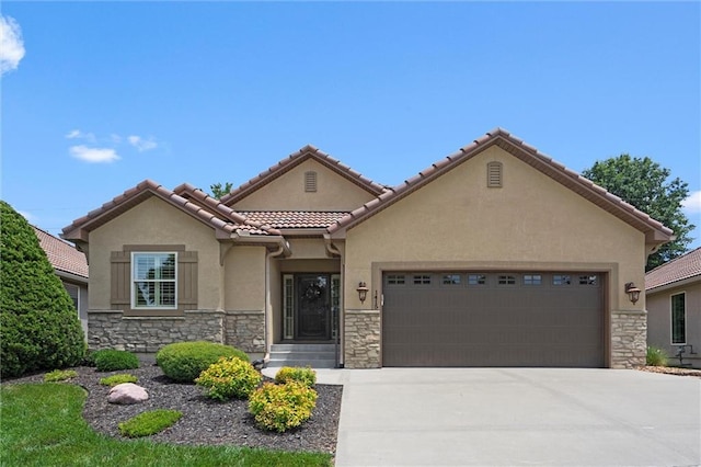 1415 SW Antiquity Dr, Lees Summit, MO 64081 - mediterranean / spanish house featuring stone siding, stucco siding, a garage, and concrete driveway