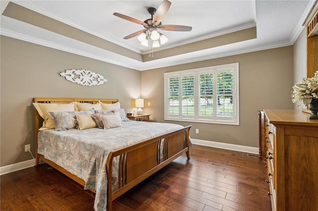 1415 SW Antiquity Dr, Lees Summit, MO 64081 - bedroom featuring a raised ceiling, crown molding, dark wood-style flooring, and ceiling fan