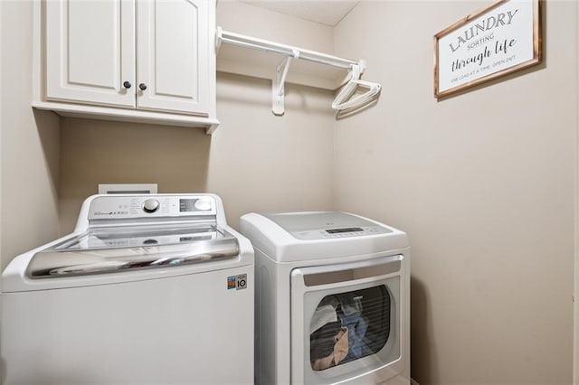 1415 SW Antiquity Dr, Lees Summit, MO 64081 - laundry room with cabinet space and independent washer and dryer