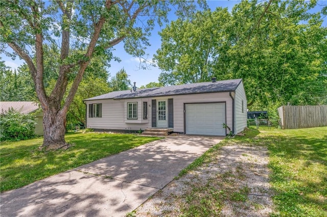 600 W Powahatan Ct, Independence, MO 64056 - ranch-style home featuring driveway and an attached garage