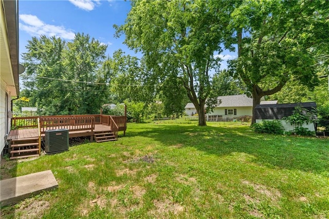 600 W Powahatan Ct, Independence, MO 64056 - view of grassy yard with a deck and an outdoor structure
