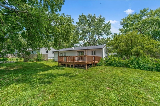 600 W Powahatan Ct, Independence, MO 64056 - back of property featuring a deck and a yard