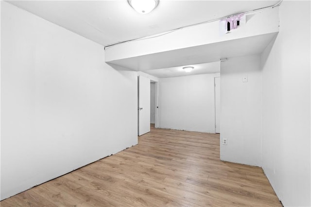 600 W Powahatan Ct, Independence, MO 64056 - finished basement with light wood finished floors