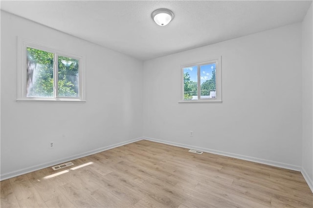 600 W Powahatan Ct, Independence, MO 64056 - unfurnished room featuring light wood-type flooring and baseboards