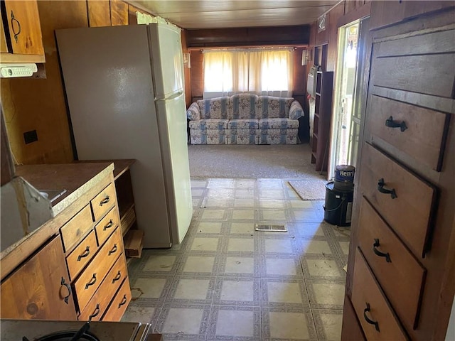 39055 Railroad Ave, Osawatomie, KS 66064 - kitchen featuring freestanding refrigerator and light flooring