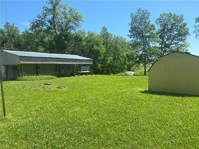 39055 Railroad Ave, Osawatomie, KS 66064 - view of green lawn with a storage unit