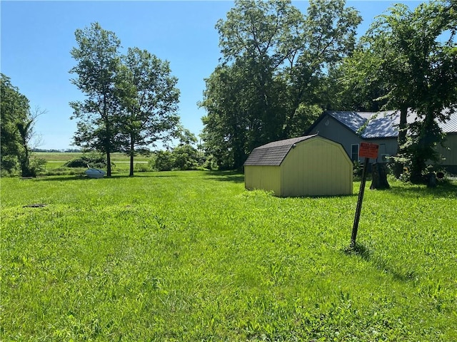 39055 Railroad Ave, Osawatomie, KS 66064 - view of grassy yard with a shed