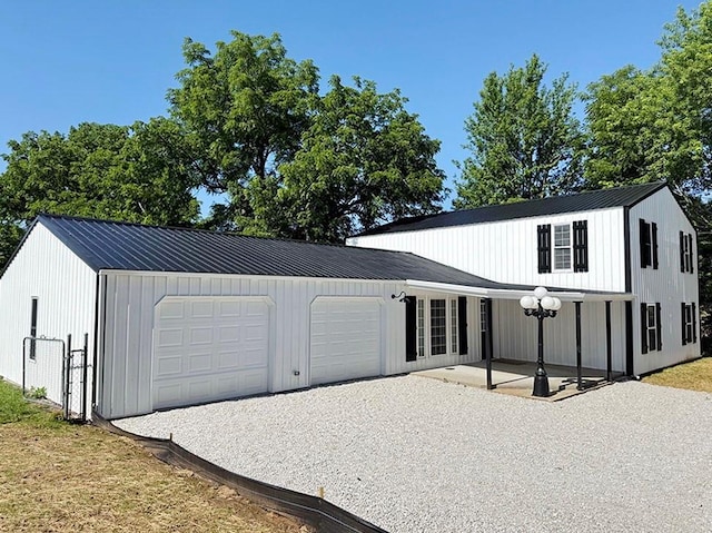 622 Morgan Dr, Stockton, MO 65785 - garage with gravel driveway