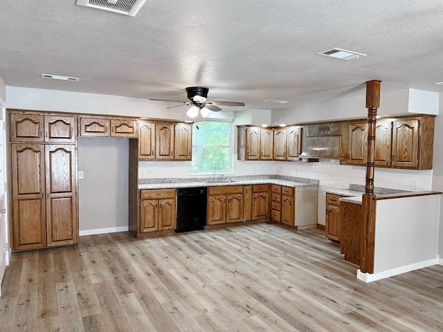 622 Morgan Dr, Stockton, MO 65785 - kitchen with dishwasher, brown cabinetry, a textured ceiling, a ceiling fan, and light wood-style floors