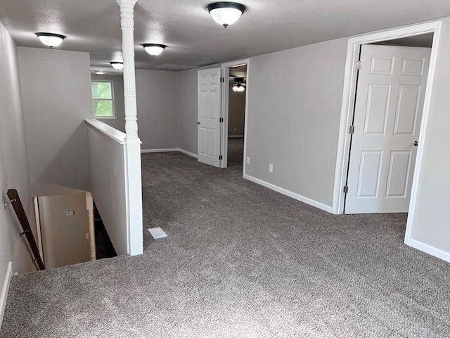 622 Morgan Dr, Stockton, MO 65785 - carpeted empty room featuring a textured ceiling and baseboards