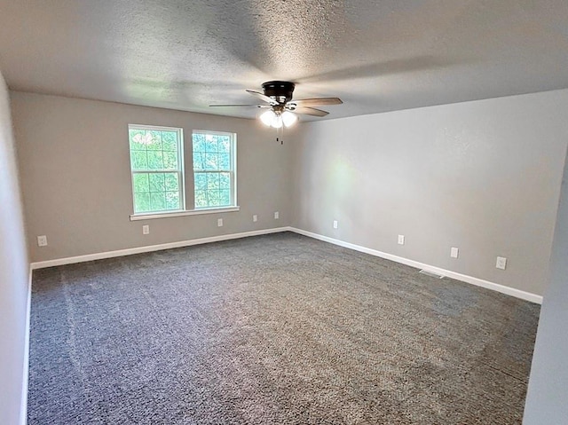 622 Morgan Dr, Stockton, MO 65785 - unfurnished room featuring a ceiling fan, a textured ceiling, and dark carpet