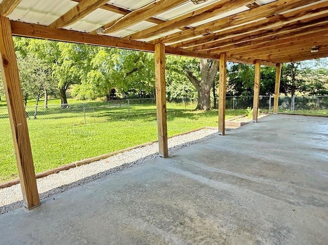 622 Morgan Dr, Stockton, MO 65785 - fenced backyard featuring a patio and view of scattered trees