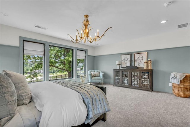 12811 W 71st St, Shawnee, KS 66216 - carpeted bedroom featuring a chandelier and recessed lighting
