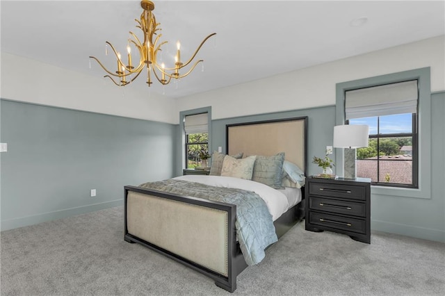 12811 W 71st St, Shawnee, KS 66216 - carpeted bedroom featuring a chandelier and multiple windows